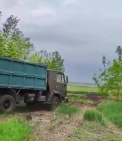 Russian truck attempted to drive over a ditch but was blown up by a Ukrainian mine