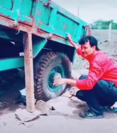 Getting a dump truck out of a pothole. Trust Me, I'm an Engineer.