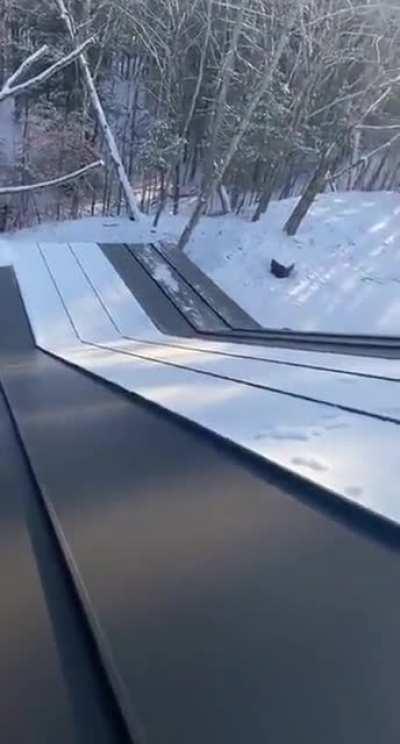 Removing snow from new metal roof