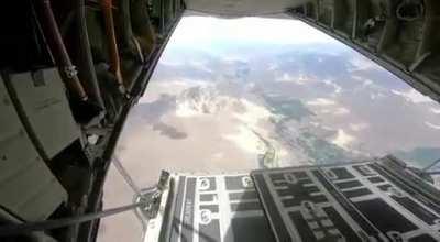 Indian Army paratroopers exit their C-130J over Stakna, Ladakh (India-China Himalayan border)