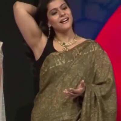 Kajol knows that people love her armpits - Here she flaunts them and the cameras start flashing immediately!