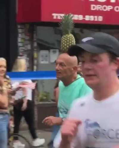 Guy runs 26 miles with a pineapple balanced on his head in new york