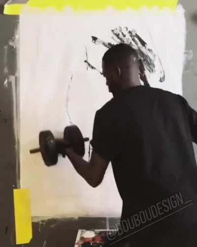 Artist uses dumbbell to paint perfect portrait of The Rock..