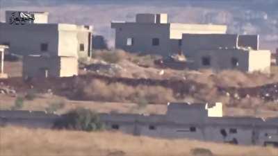 Opposition BGM-71 TOW team engages an SAA tank as it breaks cover to engage targets - al-Masasna Checkpoint - 11/3/2015