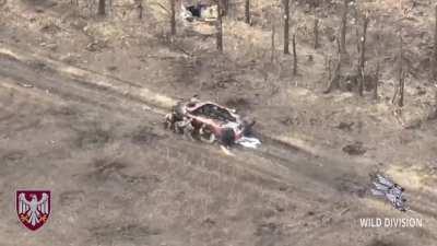 Air Burst UA FPV drone hitting a Russian group huddling behind a wrecked vehicle. Southern direction, October 2023.