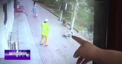 A cat falls off a building and manages to hit a guy slap bang on the head