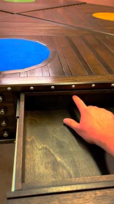 This handcrafted table with multitude of secret compartments