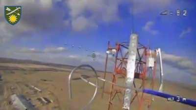 Destruction of a Russian radio relay by a FPV drone in Novovodyane, Luhansk region. (12/2023)