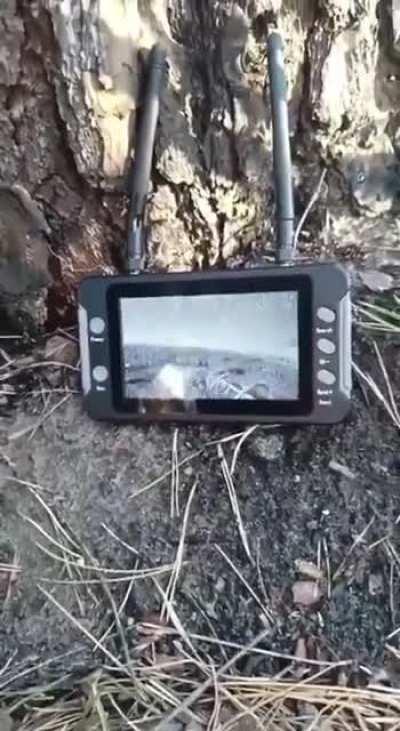 Russian military personnel use a Chinese monitor 'Sologood' to intercept and view video footage from Ukrainian FPV drones.