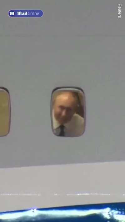 Russian president Vladimir Putin waving goodbye to his friend, Kim Jong Un