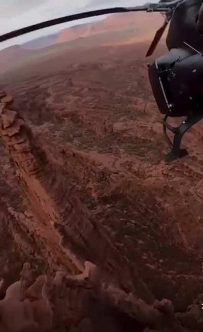 Dropping of some climbers on top of a spire