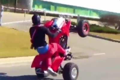 To wheelie a four wheeler