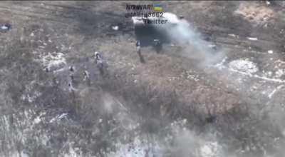 Russian armored vehicle hitting Ukraine mine causing troops to frantically dismount