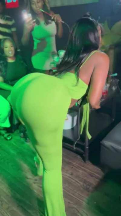 Big fake booty in the club