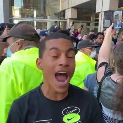 Black guy interrupts fascist mob in Detroit