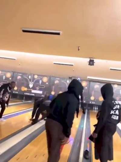 Dude gets jumped by DaBaby and his crew at a bowling alley