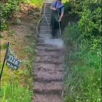 Power washing overgrown stairs