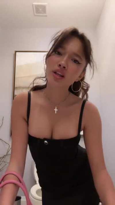 Lily Chee in a black dress