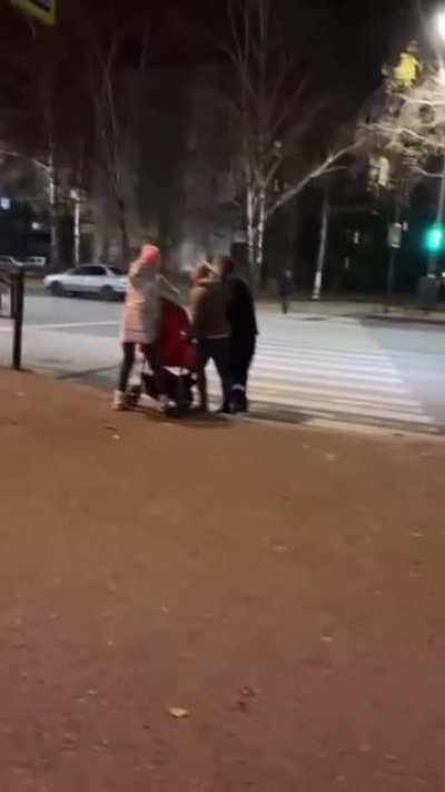 Narcotized parents encourage their kid to cross a street on red