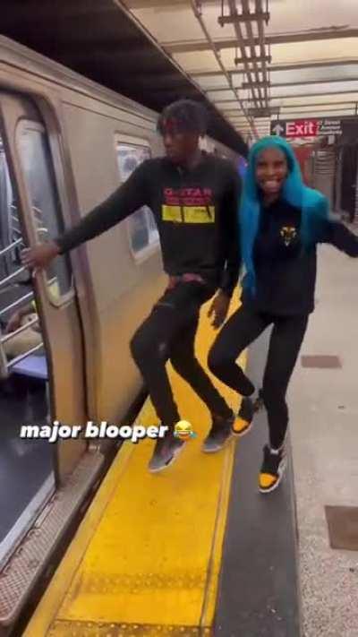 Holding up a train for a tiktok dance