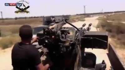 Compilation of Al Nusra and FSA fighters battling against advancing Syrian Arab Army and Hezbollah forces during the Battle of Al Qusayr, 2013 