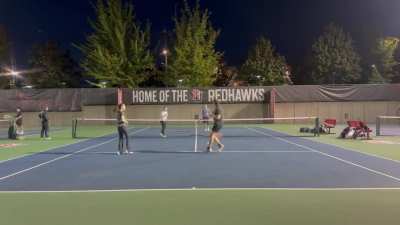 Tennis doubles player freaks out after ball is hit towards her