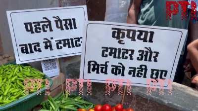 A vegetable vendor in Varanasi, UP has hired bouncers to keep customers at bay when they come to buy tomatoes, whose price has increased massively over the past few days. 