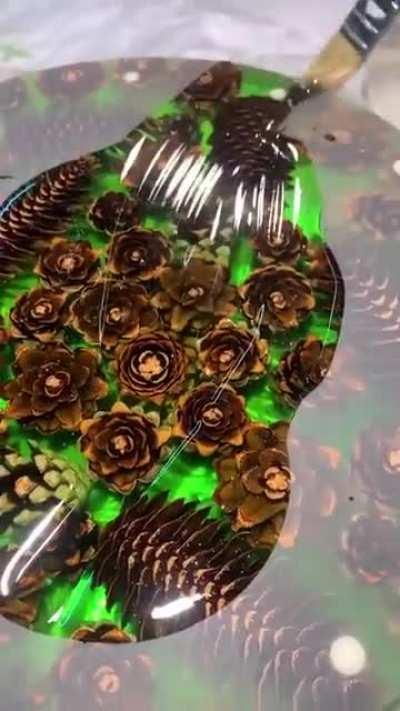 This pinecone themed epoxy art