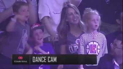 Kid pulls a bait and switch on the dance cam.