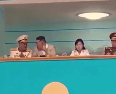 Kim jong un watching a volleyball game 