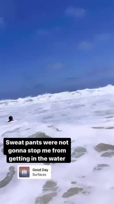 In the water with sweatpants