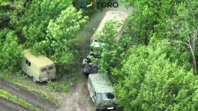 Ukraine FPV loitering munition strikes on a Russian Ural truck and a pair of Bukhankas.