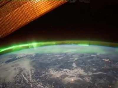 Footage of Aurora Borealis over the North Pacific Ocean, Canada and Illinois, taken on board the ISS