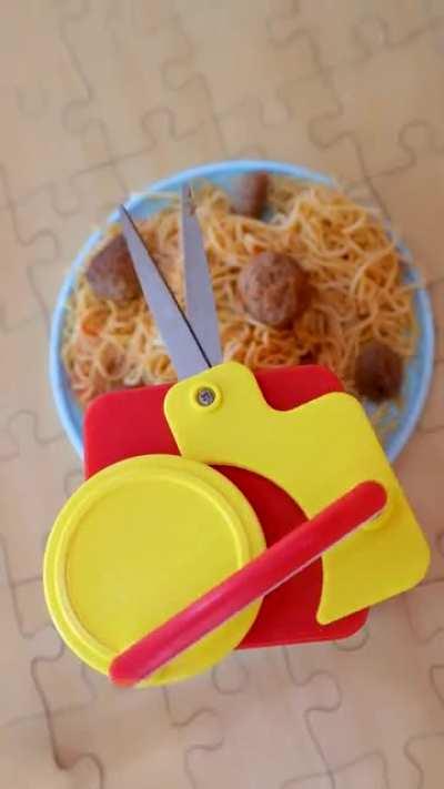 I design unnecessary products and today I made the easiest way to cut your spaghetti down into bite size portions.