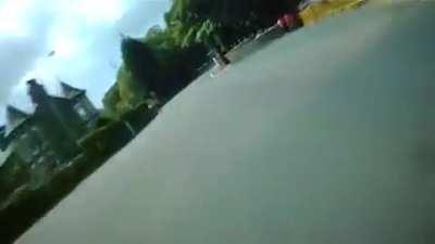 POV of a professional motorcyclist racing along a public road at 200mph