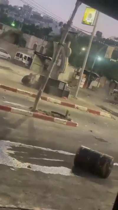 Palestinian militants in a firefight with IDF in Jenin.