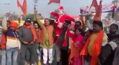 Right-wingers celebrate Christmas by burning an effigy of Santa Claus