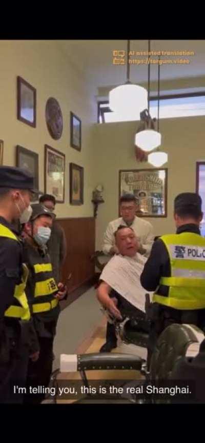 Shanghai Man In Barbershop Lecturing The Police After They Tried Coming In To Shut It Down