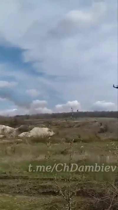 Mi-35M attack helicopter of the Russian Air Force's fires unguided missiles at the Ukrainian armed forces' positions in Donbass.