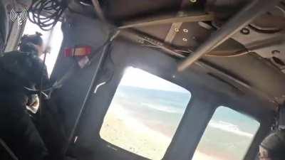 '669' Pararescue unit in a UH-60 Blackhawk medevacs two wounded off Gaza beach