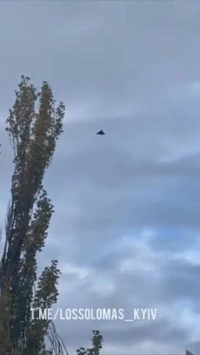 Another Russian attack on civilian infrastructure: Russian Shaheed drones flying over burning residential houses in Kyiv. 02.11.2024