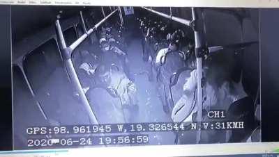 Bus is robbed my a couple of thieves.