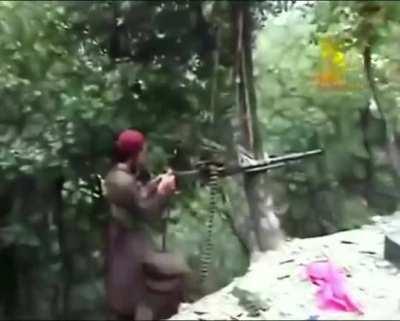 Tehreek e Taliban Pakistan / TTP deploys a DShK Heavy Machine Gun / HMG in a peculiar way by tying it to a tree. They also fire antique style cannons