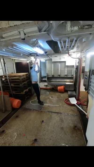 The inside of a fishing boat during a storm