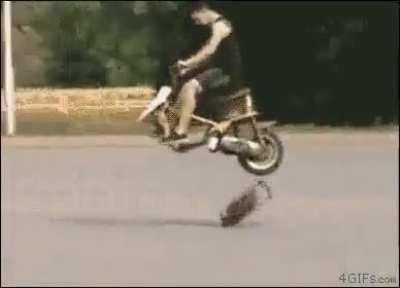 WCGW driving an old cheap motorcycle