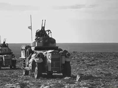 RAF Rolls-Royce Fordson armored cars in North Africa, that terrain you see it's what dessert looks like in that area of operations were Axis and Allied fought, not the sand sea like you may have in mind.