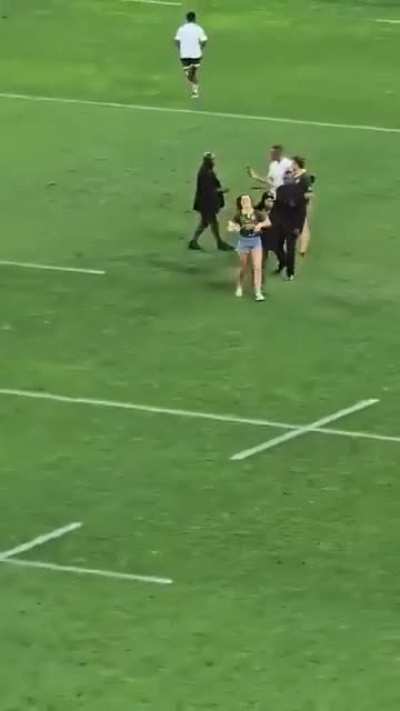 A bunch of rugby fans invade the pitch and one ends up getting KO'd