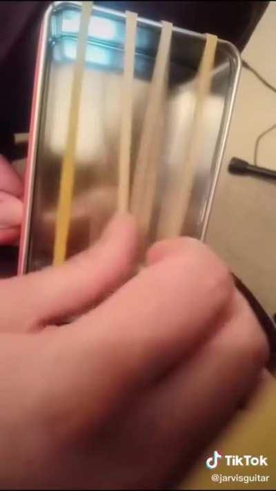 This rubber band instrument thing and her ability to play it