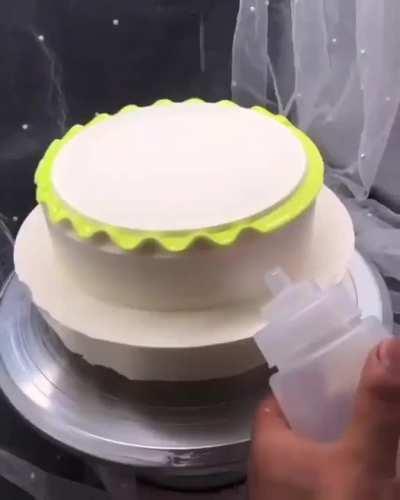 Decorating this cake.