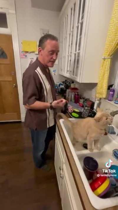 Dad complaining about his cat